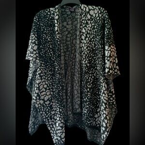 Woman’s sweater shawl